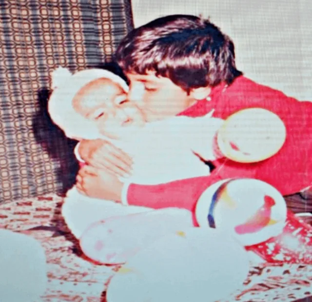 Sachin as a boy, hugging his baby brother Salil. An old family photo.