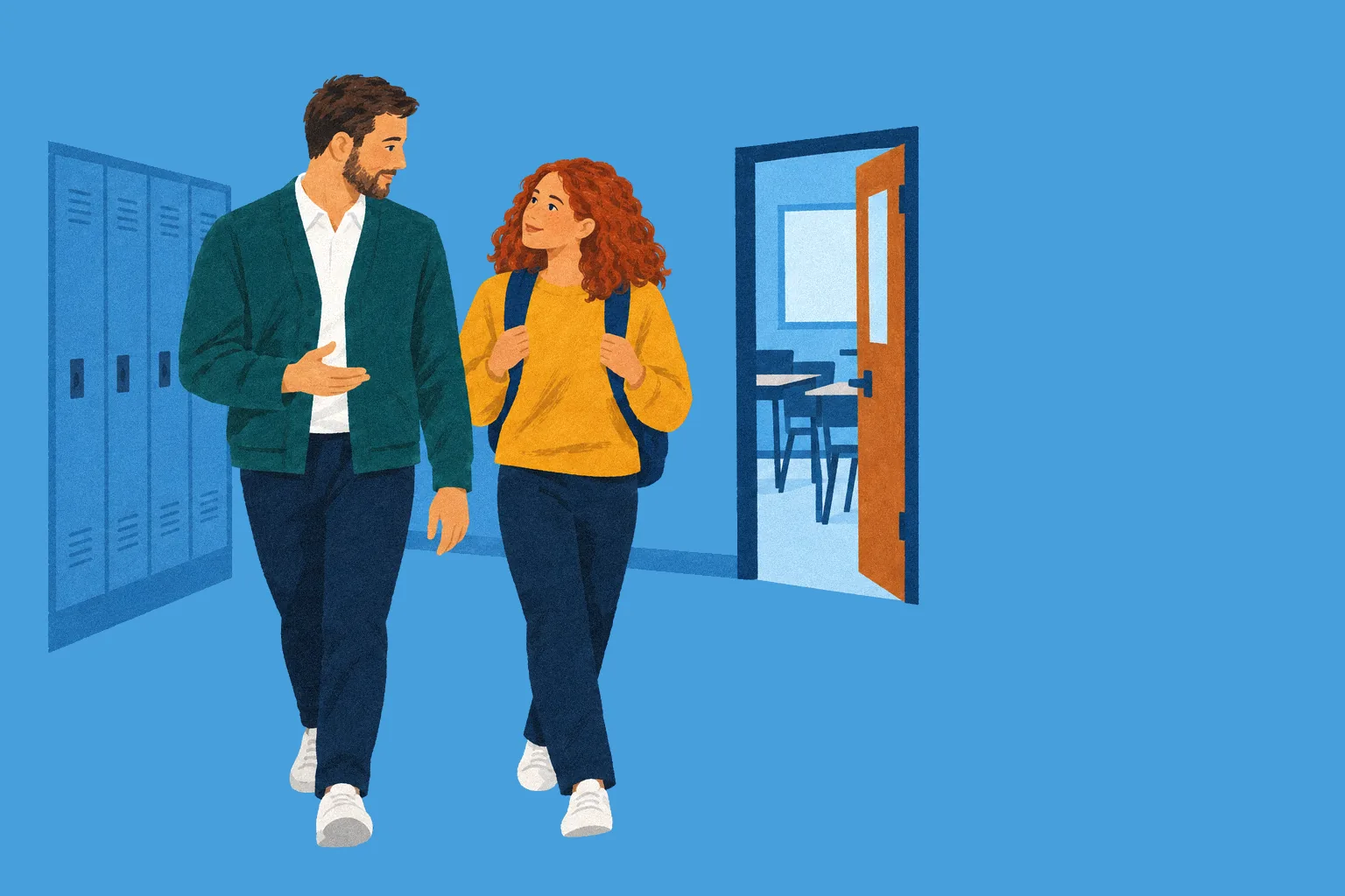 A support staff member walks a student back to class, the two of them talking.